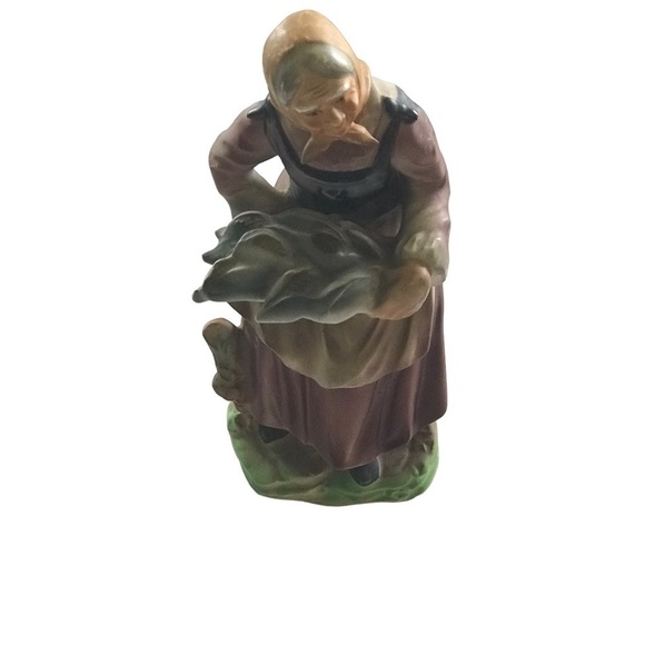Porcelain Old Lady Holding Basket of Fish Figurine - Picture 1 of 4